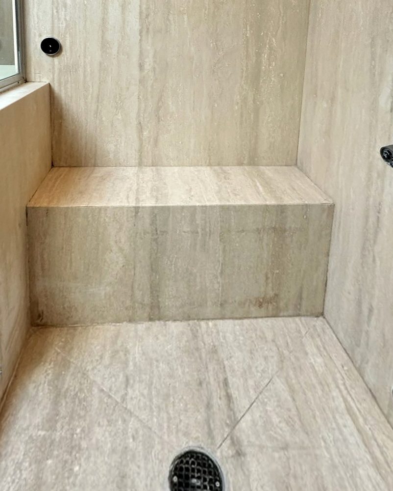 Travertine shower before restoration