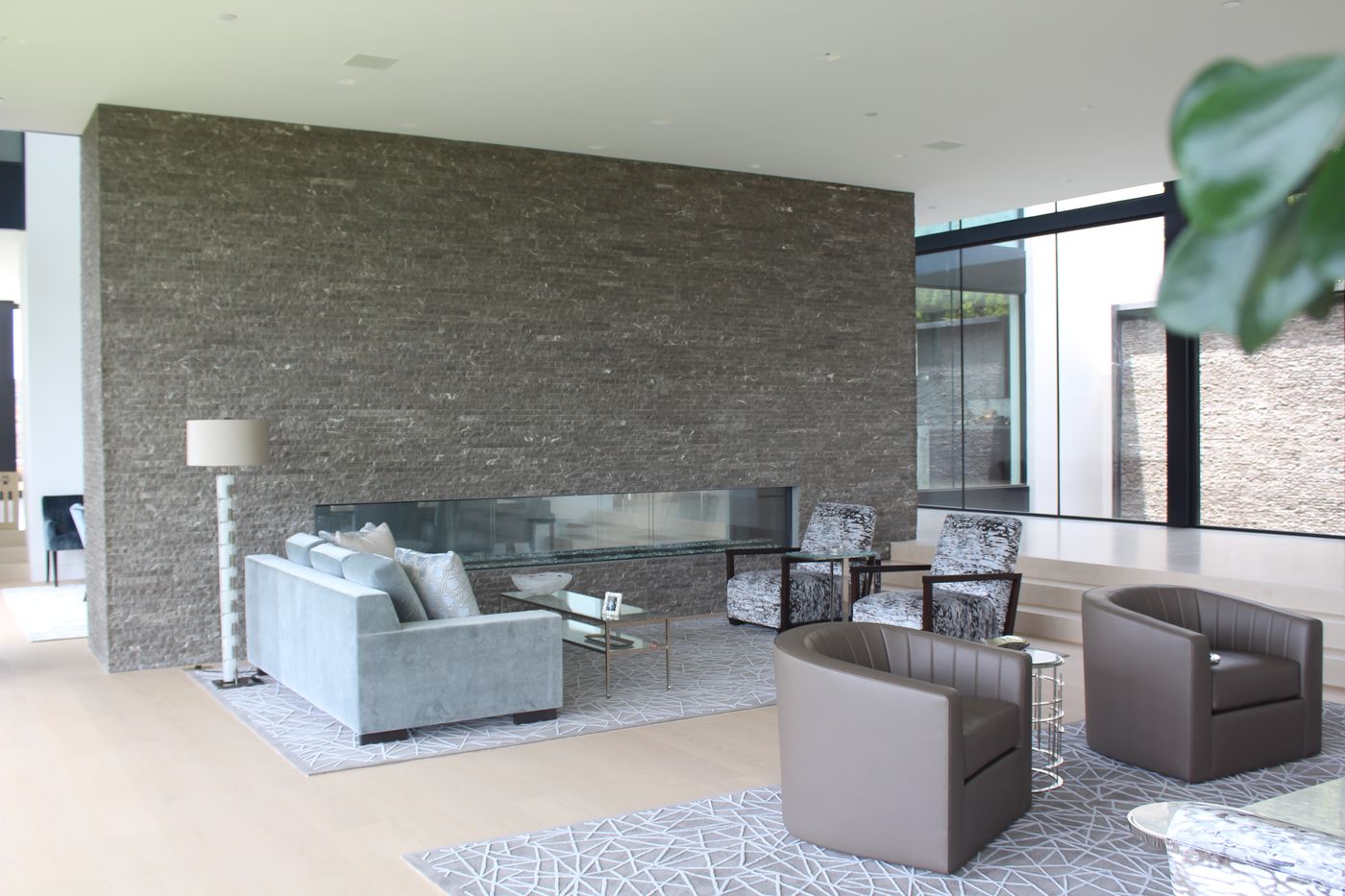 Split-face stone fireplace wall